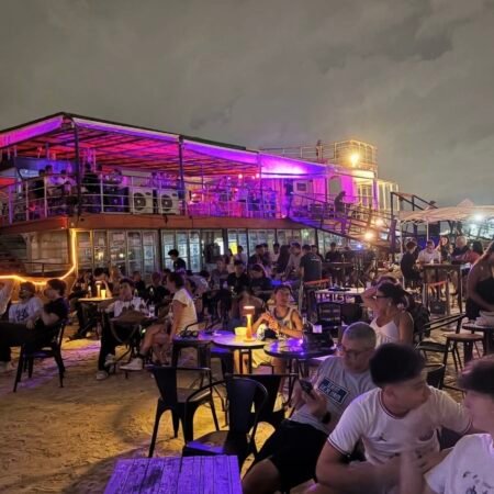 view on the beach of Bangkok island with the boat in the background